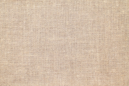 Natural Linen Material Textile Canvas Fabric Texture Background Close-up Detail of Fabric Natural Color Hemp Material Pattern Design Wallpaper.の写真素材