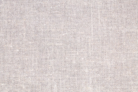 Natural Linen Material Textile Canvas Fabric Texture Background Close-up Detail of Fabric Natural Color Hemp Material Pattern Design Wallpaper. Can be Used as Background or For Graの写真素材