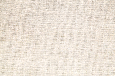 Natural Linen Material Textile Canvas Fabric Texture Background Close-up Detail of Fabric Natural Color Hemp Material Pattern Design Wallpaper. Can be Used as Background or For Graの写真素材