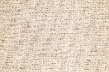 Natural Linen Material Textile Canvas Fabric Texture Background Close-up Detail of Fabric Natural Color Hemp Material Pattern Design Wallpaper. Can be Used as Background or For Graの写真素材