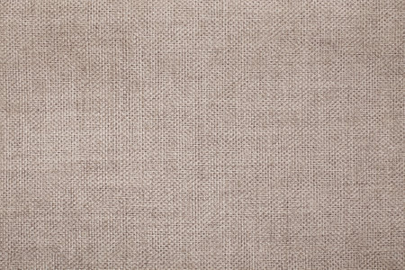 Natural Linen Material Textile Canvas Fabric Texture Background Close-up Detail of Fabric Natural Color Hemp Material Pattern Design Wallpaper. Can be Used as Background or For Graの写真素材