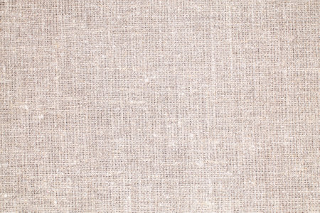 Natural Linen Material Textile Canvas Fabric Texture Background Close-up Detail of Fabric Natural Color Hemp Material Pattern Design Wallpaper. Can be Used as Backgroundの写真素材