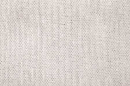 Natural Linen Material Textile Canvas Fabric Texture Background Close-up Detail of Fabric Natural Color Hemp Material Pattern Design Wallpaper. Can be Used as Backgroundの写真素材