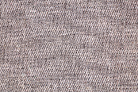 Natural Linen Material Textile Canvas Fabric Texture Background Close-up Detail of Fabric Natural Color Hemp Material Pattern Design Wallpaper. Can be Used as Backgroundの写真素材