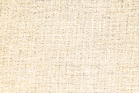 Natural Linen Material Textile Canvas Fabric Texture Background Close-up Detail of Fabric Natural Color Hemp Material Pattern Design Wallpaper. Can be Used as Backgroundの写真素材
