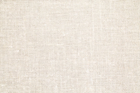 Natural Linen Material Textile Canvas Fabric Texture Background Close-up Detail of Fabric Natural Color Hemp Material Pattern Design Wallpaper. Can be Used as Backgroundの写真素材