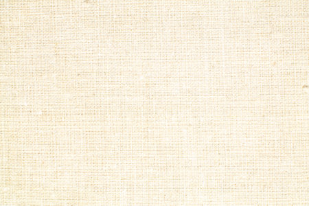 Natural Linen Material Textile Canvas Fabric Texture Background Close-up Detail of Fabric Natural Color Hemp Material Pattern Design Wallpaper. Can be Used as Backgroundの写真素材