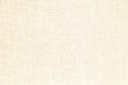 Natural Linen Material Textile Canvas Fabric Texture Background Close-up Detail of Fabric Natural Color Hemp Material Pattern Design Wallpaper. Can be Used as Backgroundの写真素材