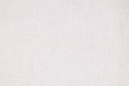 Natural Linen Material Textile Canvas Fabric Texture Background Close-up Detail of Fabric Natural Color Hemp Material Pattern Design Wallpaper. Can be Used as Backgroundの写真素材