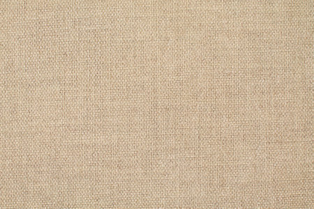 Natural Linen Material Textile Canvas Fabric Texture Background Close-up Detail of Fabric Natural Color Hemp Material Pattern Design Wallpaper. Can be Used as Backgroundの写真素材
