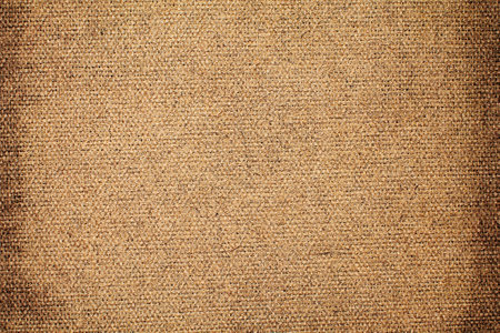 Natural Linen Material Textile Canvas Fabric Texture Background Close-up Detail of Fabric Natural Color Hemp Material Pattern Design Wallpaper. Can be Used as Backgroundの写真素材