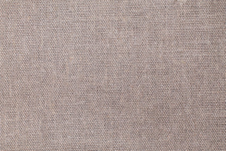Natural Linen Material Textile Canvas Fabric Texture Background Close-up Detail of Fabric Natural Color Hemp Material Pattern Design Wallpaper. Can be Used as Backgroundの写真素材