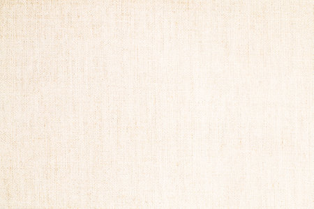 Natural Linen Material Textile Canvas Fabric Texture Background Close-up Detail of Fabric Natural Color Hemp Material Pattern Design Wallpaper. Can be Used as Backgroundの写真素材