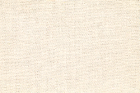 Natural Linen Material Textile Canvas Fabric Texture Background Close-up Detail of Fabric Natural Color Hemp Material Pattern Design Wallpaper. Can be Used as Backgroundの写真素材