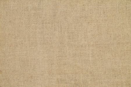 Natural Linen Material Textile Canvas Fabric Texture Background Close-up Detail of Fabric Natural Color Hemp Material Pattern Design Wallpaperの写真素材