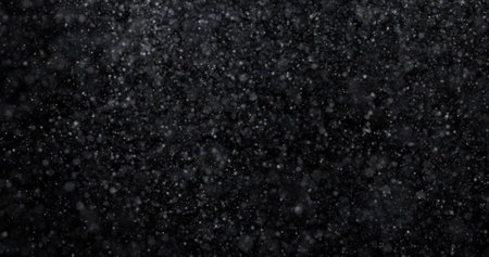 abstract splashes of water on a black background.の写真素材
