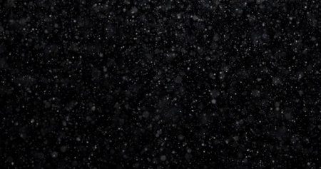 Snow on a black background. Snowflakes on a black backgroundの写真素材