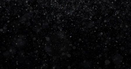 Snow on black background. Snowflakes on a black background.の写真素材