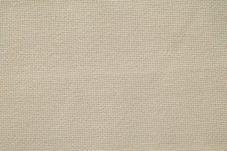 Closeup detail of beige fabric texture background. High resolution photo.の写真素材