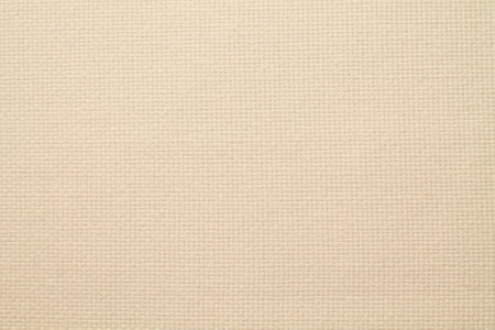 Close up of beige canvas texture background. High resolution photo.の写真素材