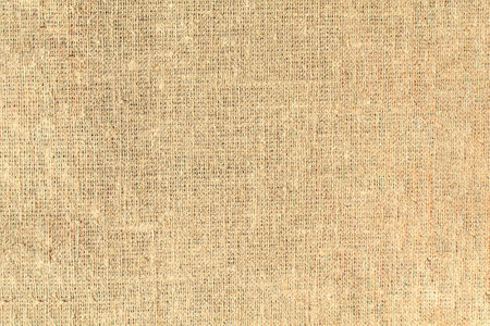 Closeup detail of beige fabric texture background. Beige canvas texture.の写真素材
