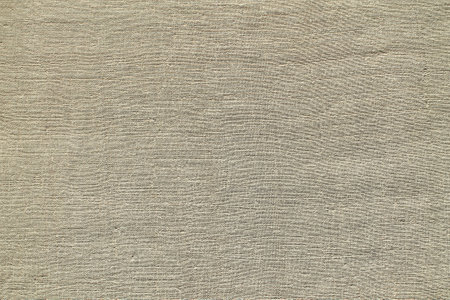 Closeup detail of beige fabric texture background. Horizontal.の写真素材