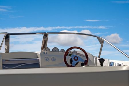 Wooden steering wheel of yachtの写真素材