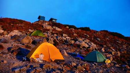 camping site on the mountain ridgeの写真素材