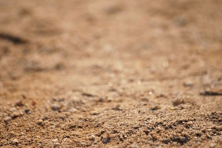 crystal yellow sand macro background, sharp focus is on the foreground part onlyの写真素材