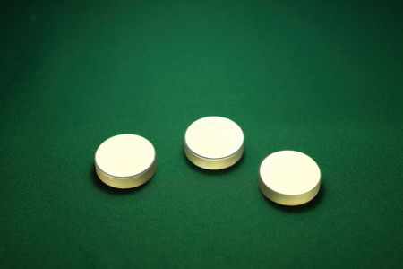 specially coated optical mirrors for laser industry and science on the green background; selective focus on central mirrorの写真素材