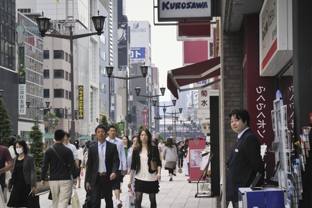 Tokyo, Japan - May 17, 2008 : people crowds move freely along Ginza street of Tokyo metropolis. Ginza is worldwide famous Tokyo shopping street full of fashion boutiques and shops.のeditorial素材