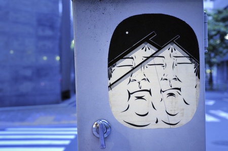 Tokyo, Japan - May 17, 2008 : Japanese graffiti on the street lamp mast in central part of Tokyo cityのeditorial素材