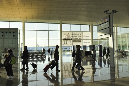 Barcelona, Spain - November 09, 2009 : passengers move inside famous El Prat airport of Barcelona by early morning.のeditorial素材