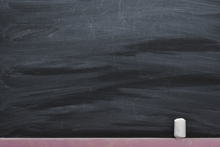 hi-res black chalkboard fragment with white chalk piece の写真素材