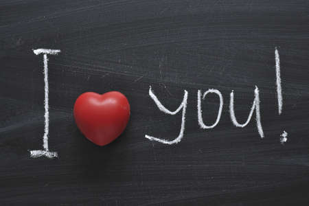 I love you concept handwritten on black chalkboardの写真素材