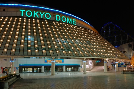 Tokyo, Japan - February 14, 2008: famous Tokyo Dome arena building in Korakuen district of Japanese capital with scenic evening illumination. Also Tokyo Dome is known as largest concert hall in Japan.のeditorial素材