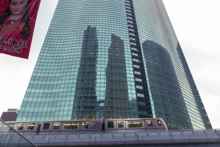 Tokyo, Japan - May 17, 2008 : elevated train of Tokyo Yurikamome line moves in front of famous...