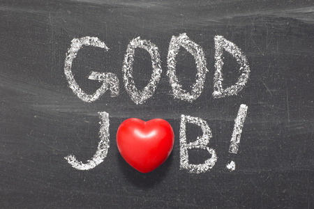 Good Job  Phrase handwritten on school blackboardの写真素材