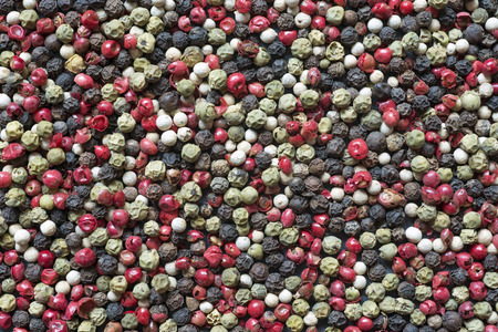 different types of peppercorns as a backgroundの写真素材