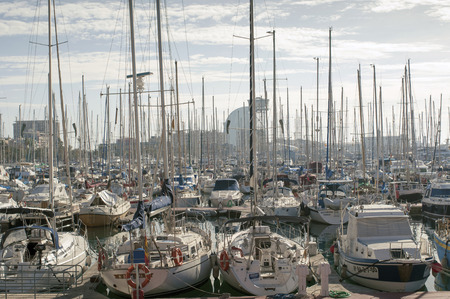 Barcelona, Spain - November 15, 2009: many yachts at famous Port Vell area in Barcelona city.のeditorial素材