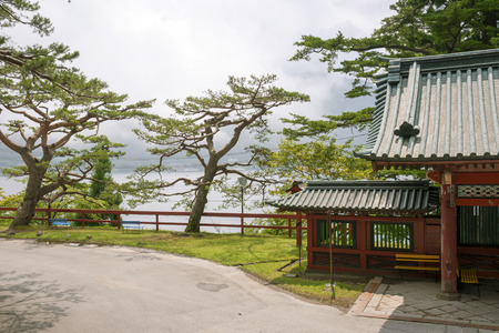 Japanese landscape with temple fragment and scenic pine treeのeditorial素材