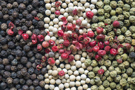 mixed green, black, white and red pepper corns variationの写真素材