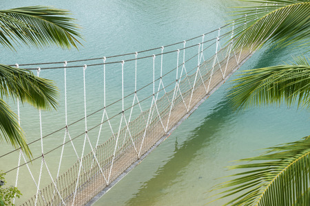 scenic hanged bridge over sea water on the Sentosa island in Singapore