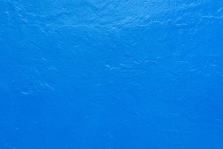 detailed blue painted wall backgroundの写真素材