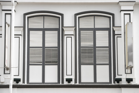 wooden frame windows with traditional shutters in Singapore Chinatownのeditorial素材