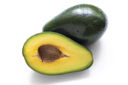 fresh ripe avocado half and whole fruit isolated on white background