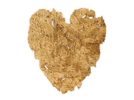 heart figure made from ancient detailed wooden sheet eaten by worms and bugsの写真素材
