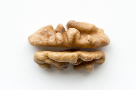 walnut core closeup isolated on whiteの写真素材