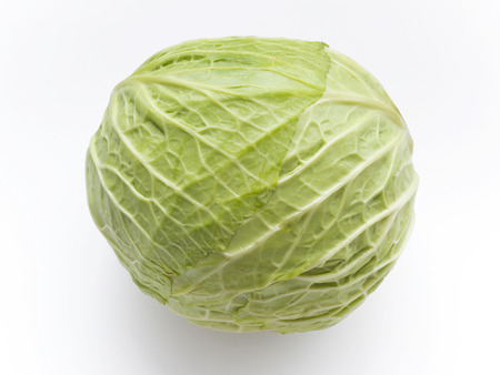 fresh green head of cabbage isolated on white