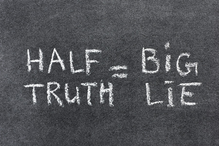 simple chalkboard interpretation of famous B.Franklin quote - half a truth is often a great lieの写真素材